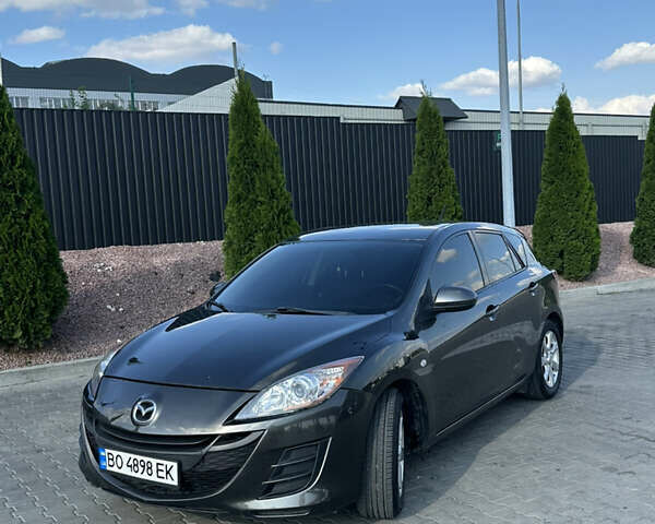 Серый Мазда 3, объемом двигателя 1.6 л и пробегом 176 тыс. км за 7300 $, фото 1 на Automoto.ua