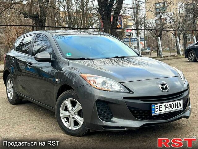 Серый Мазда 3, объемом двигателя 1.6 л и пробегом 210 тыс. км за 7300 $, фото 1 на Automoto.ua