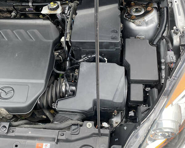 Серый Мазда 3, объемом двигателя 1.6 л и пробегом 164 тыс. км за 8500 $, фото 37 на Automoto.ua