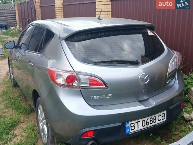 Серый Мазда 3, объемом двигателя 2 л и пробегом 82 тыс. км за 7300 $, фото 1 на Automoto.ua