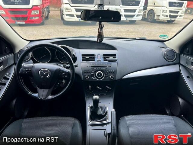 Серый Мазда 3, объемом двигателя 1.6 л и пробегом 210 тыс. км за 7300 $, фото 4 на Automoto.ua