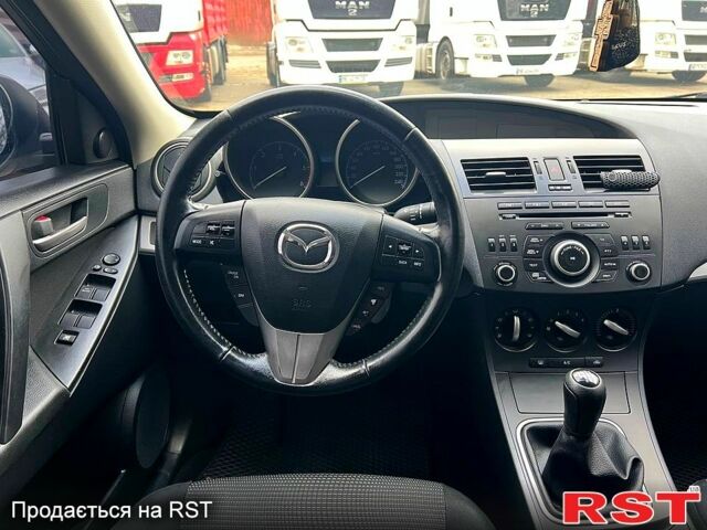 Серый Мазда 3, объемом двигателя 1.6 л и пробегом 210 тыс. км за 7300 $, фото 5 на Automoto.ua