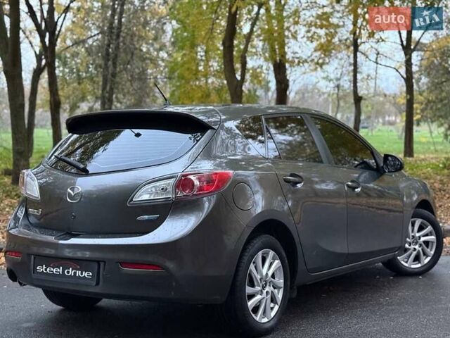 Серый Мазда 3, объемом двигателя 2 л и пробегом 160 тыс. км за 8699 $, фото 5 на Automoto.ua