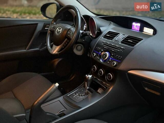 Серый Мазда 3, объемом двигателя 2 л и пробегом 160 тыс. км за 8699 $, фото 16 на Automoto.ua