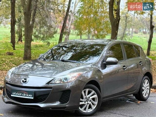 Серый Мазда 3, объемом двигателя 2 л и пробегом 160 тыс. км за 8699 $, фото 1 на Automoto.ua
