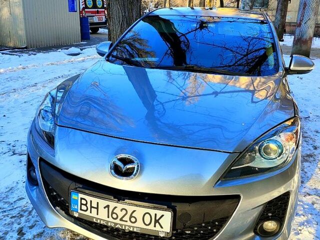 Сірий Мазда 3, об'ємом двигуна 2 л та пробігом 223 тис. км за 8999 $, фото 1 на Automoto.ua