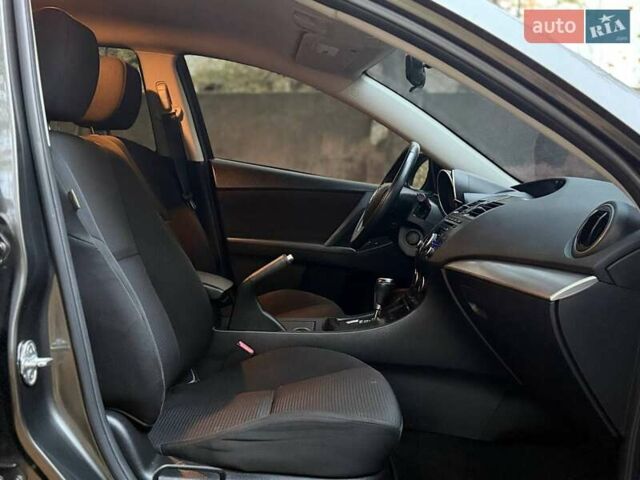 Серый Мазда 3, объемом двигателя 2 л и пробегом 160 тыс. км за 8699 $, фото 14 на Automoto.ua