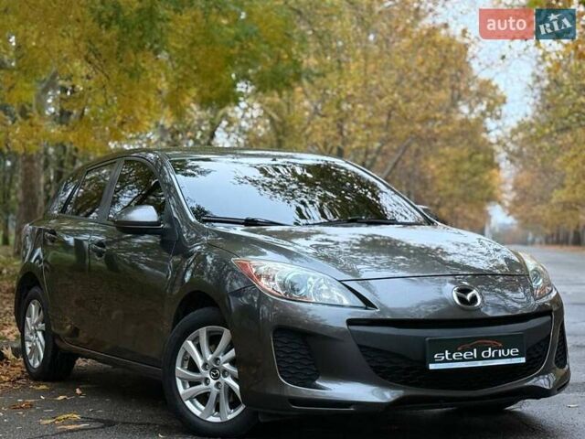 Серый Мазда 3, объемом двигателя 2 л и пробегом 160 тыс. км за 8699 $, фото 7 на Automoto.ua
