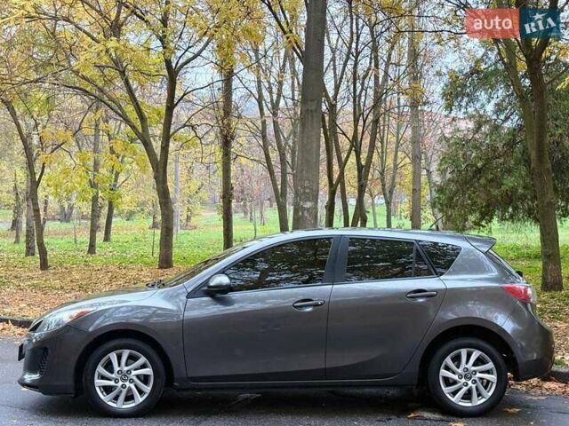 Серый Мазда 3, объемом двигателя 2 л и пробегом 160 тыс. км за 8699 $, фото 2 на Automoto.ua