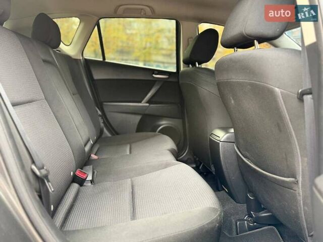 Серый Мазда 3, объемом двигателя 2 л и пробегом 160 тыс. км за 8699 $, фото 13 на Automoto.ua