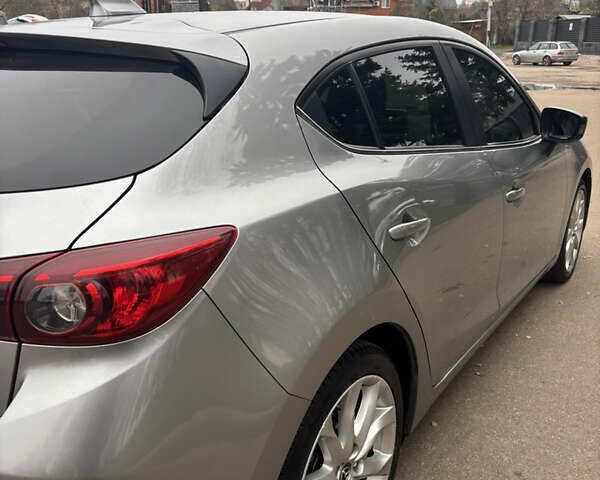 Серый Мазда 3, объемом двигателя 2.19 л и пробегом 190 тыс. км за 10300 $, фото 5 на Automoto.ua