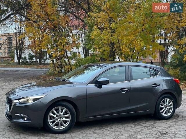 Серый Мазда 3, объемом двигателя 1.5 л и пробегом 39 тыс. км за 13790 $, фото 14 на Automoto.ua