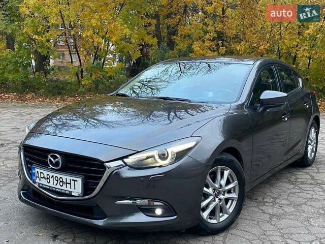 Серый Мазда 3, объемом двигателя 1.5 л и пробегом 39 тыс. км за 13790 $, фото 6 на Automoto.ua