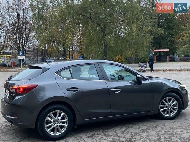 Серый Мазда 3, объемом двигателя 1.5 л и пробегом 39 тыс. км за 13790 $, фото 9 на Automoto.ua