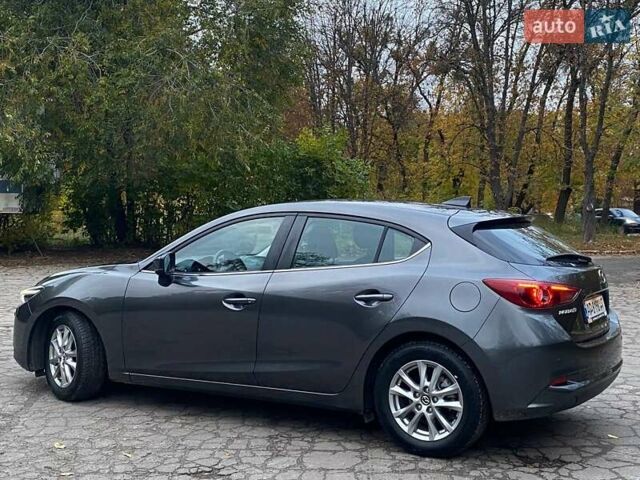 Серый Мазда 3, объемом двигателя 1.5 л и пробегом 39 тыс. км за 13790 $, фото 2 на Automoto.ua