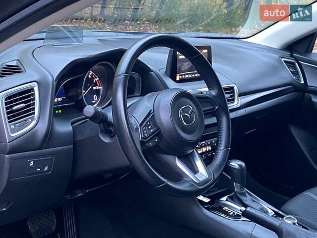 Серый Мазда 3, объемом двигателя 1.5 л и пробегом 39 тыс. км за 13790 $, фото 27 на Automoto.ua