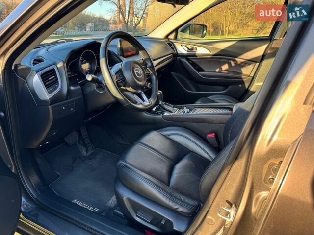 Серый Мазда 3, объемом двигателя 2 л и пробегом 87 тыс. км за 13000 $, фото 12 на Automoto.ua