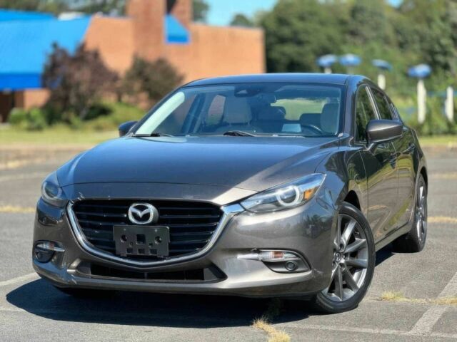 Серый Мазда 3, объемом двигателя 2.5 л и пробегом 47 тыс. км за 7000 $, фото 2 на Automoto.ua