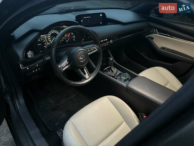 Серый Мазда 3, объемом двигателя 2.49 л и пробегом 58 тыс. км за 17900 $, фото 3 на Automoto.ua