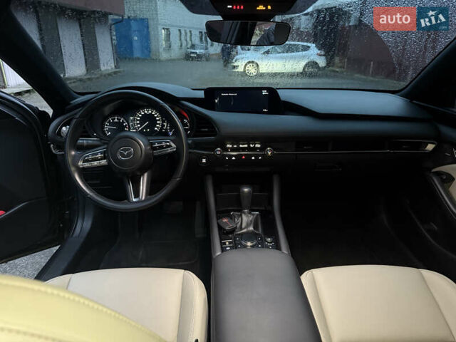 Серый Мазда 3, объемом двигателя 2.49 л и пробегом 58 тыс. км за 17900 $, фото 2 на Automoto.ua