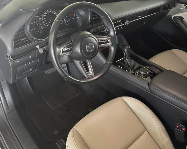 Серый Мазда 3, объемом двигателя 2.49 л и пробегом 57 тыс. км за 18400 $, фото 6 на Automoto.ua