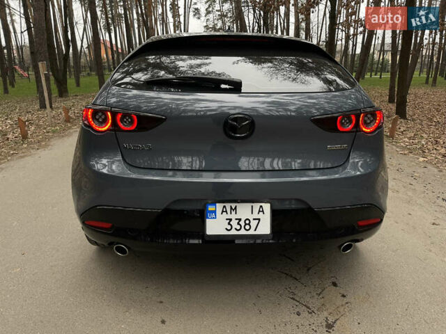 Серый Мазда 3, объемом двигателя 2.49 л и пробегом 65 тыс. км за 17000 $, фото 6 на Automoto.ua