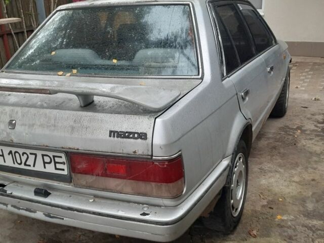 Серый Мазда 3, объемом двигателя 1.6 л и пробегом 330 тыс. км за 500 $, фото 9 на Automoto.ua