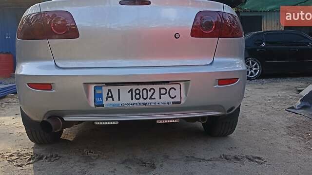Серый Мазда 3, объемом двигателя 2 л и пробегом 345 тыс. км за 4150 $, фото 5 на Automoto.ua