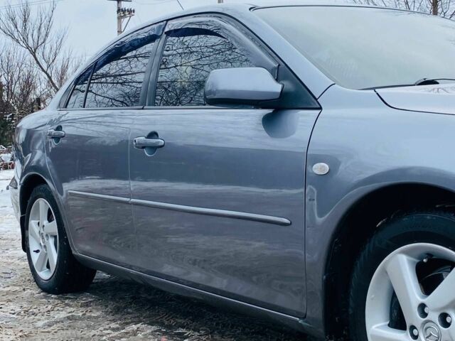 Сірий Мазда 3, об'ємом двигуна 2 л та пробігом 170 тис. км за 5000 $, фото 5 на Automoto.ua
