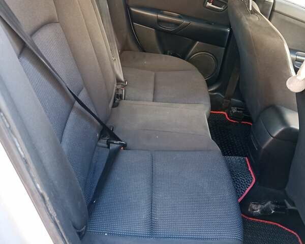 Серый Мазда 3, объемом двигателя 2 л и пробегом 345 тыс. км за 4150 $, фото 3 на Automoto.ua