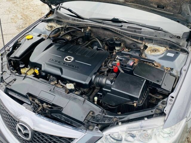 Сірий Мазда 3, об'ємом двигуна 2 л та пробігом 170 тис. км за 5000 $, фото 10 на Automoto.ua