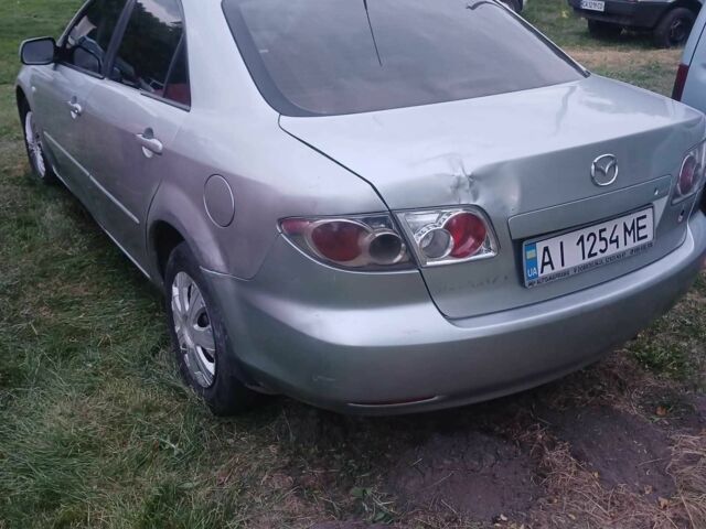 Сірий Мазда 3, об'ємом двигуна 2 л та пробігом 390 тис. км за 1500 $, фото 2 на Automoto.ua