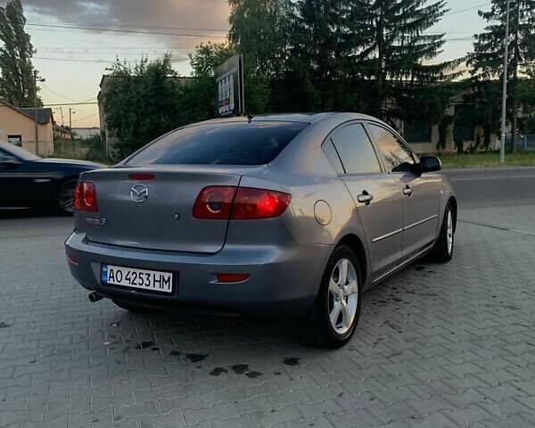 Серый Мазда 3, объемом двигателя 1.6 л и пробегом 137 тыс. км за 3600 $, фото 4 на Automoto.ua