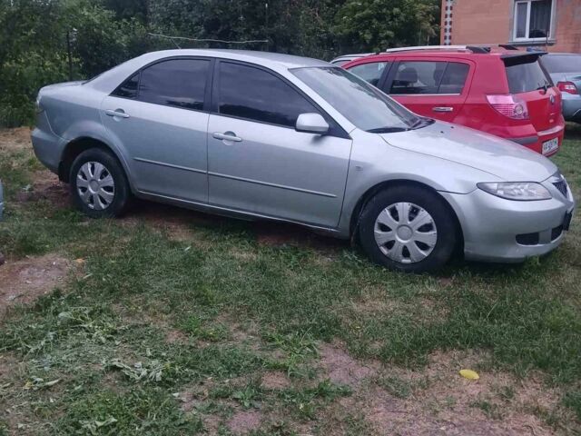 Сірий Мазда 3, об'ємом двигуна 2 л та пробігом 390 тис. км за 1500 $, фото 1 на Automoto.ua