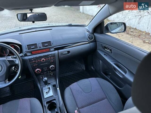 Сірий Мазда 3, об'ємом двигуна 1.6 л та пробігом 132 тис. км за 5500 $, фото 14 на Automoto.ua