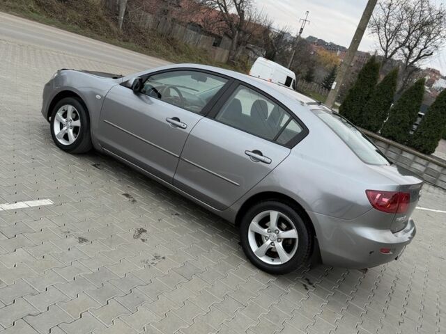 Серый Мазда 3, объемом двигателя 1.6 л и пробегом 220 тыс. км за 3650 $, фото 8 на Automoto.ua