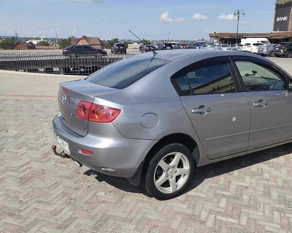 Серый Мазда 3, объемом двигателя 1.6 л и пробегом 288 тыс. км за 3300 $, фото 2 на Automoto.ua