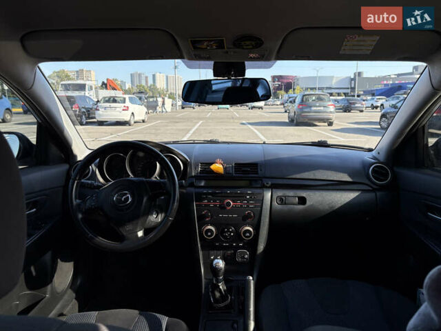 Серый Мазда 3, объемом двигателя 1.6 л и пробегом 370 тыс. км за 4000 $, фото 7 на Automoto.ua