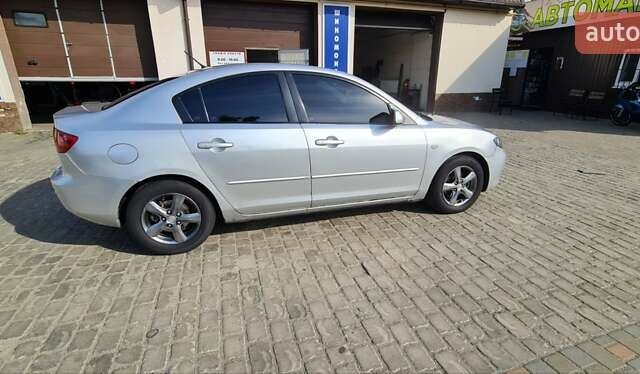 Серый Мазда 3, объемом двигателя 1.56 л и пробегом 250 тыс. км за 3900 $, фото 4 на Automoto.ua