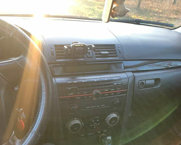 Сірий Мазда 3, об'ємом двигуна 1.56 л та пробігом 315 тис. км за 3999 $, фото 8 на Automoto.ua