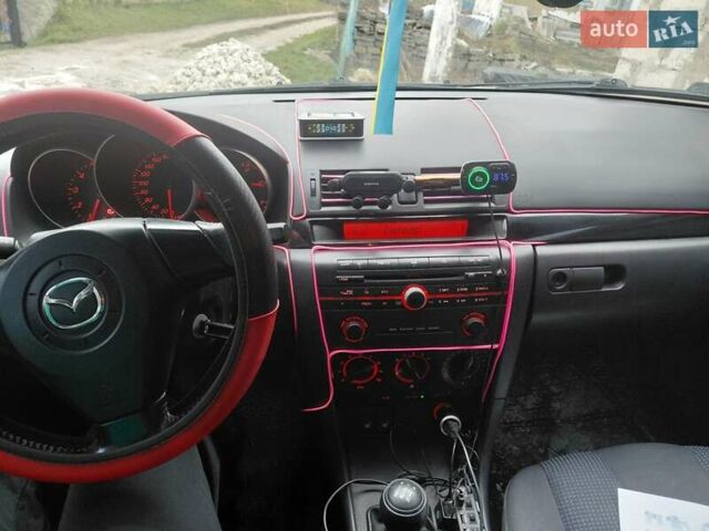 Сірий Мазда 3, об'ємом двигуна 1.56 л та пробігом 354 тис. км за 5500 $, фото 10 на Automoto.ua