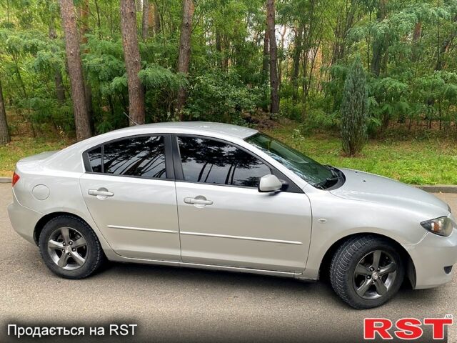 Серый Мазда 3, объемом двигателя 1.6 л и пробегом 262 тыс. км за 3600 $, фото 1 на Automoto.ua