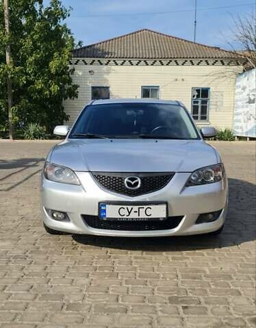 Серый Мазда 3, объемом двигателя 1.56 л и пробегом 250 тыс. км за 3900 $, фото 1 на Automoto.ua