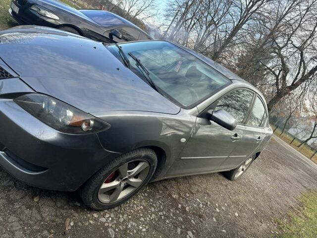 Серый Мазда 3, объемом двигателя 1.6 л и пробегом 189 тыс. км за 3350 $, фото 2 на Automoto.ua