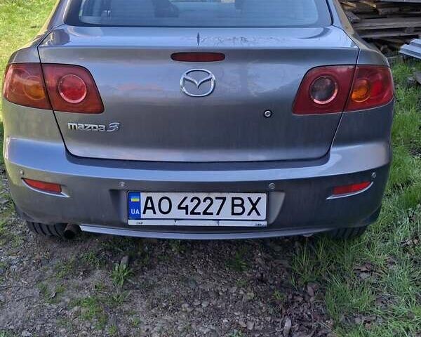 Серый Мазда 3, объемом двигателя 1.6 л и пробегом 175 тыс. км за 4600 $, фото 2 на Automoto.ua