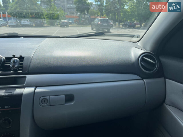 Серый Мазда 3, объемом двигателя 1.6 л и пробегом 144 тыс. км за 4400 $, фото 22 на Automoto.ua