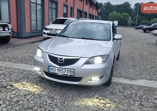 Серый Мазда 3, объемом двигателя 1.56 л и пробегом 352 тыс. км за 2800 $, фото 1 на Automoto.ua