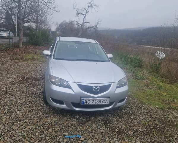Серый Мазда 3, объемом двигателя 1.6 л и пробегом 240 тыс. км за 4500 $, фото 1 на Automoto.ua