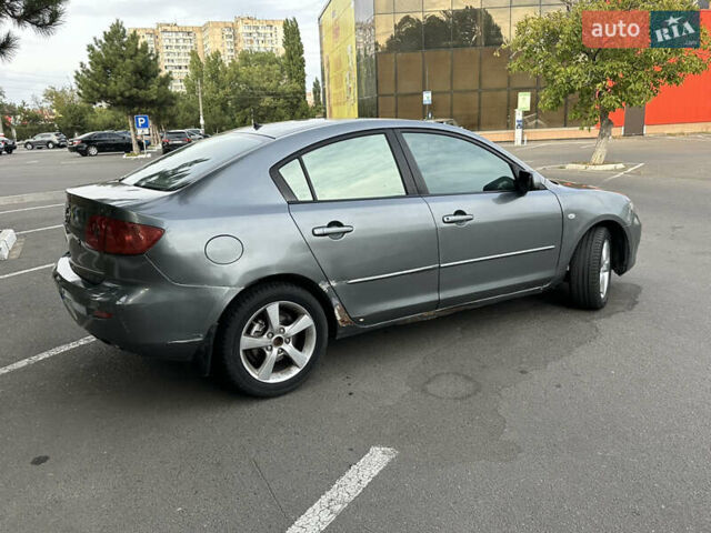 Серый Мазда 3, объемом двигателя 1.6 л и пробегом 180 тыс. км за 3000 $, фото 4 на Automoto.ua