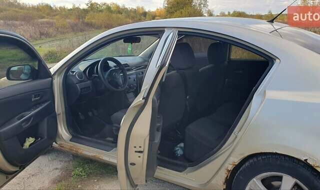 Мазда 3 2004 в Калуше на Automoto.ua Серый Мазда 3, объемом двигателя 1.6 л и пробегом 244 тыс. км за 2900 $, фото 21 на Automoto.ua